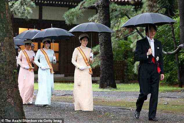 Princess Mako (in blue) has taken on a more active role within the family in the months since her uncle was made Emperor and her father heir to the throne in May. Pictured (l-r) Princess Kako, and Princess Mako with parents Crown Princess Kiko and Crown Prince Fumihito