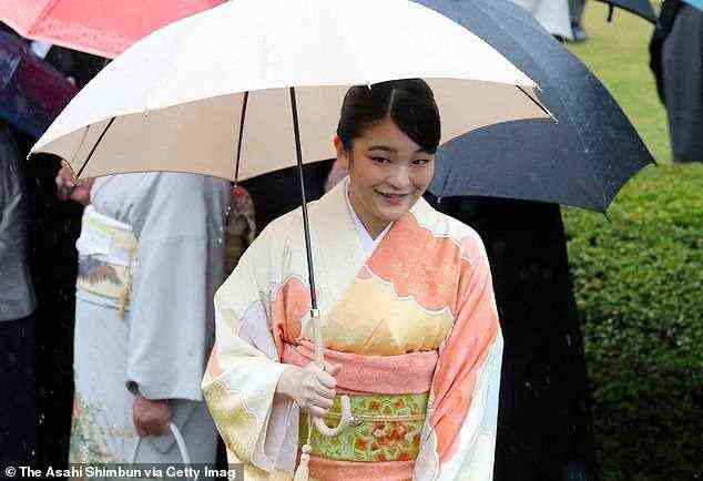 Princess Mako of Akishino talks with guests during the Autumn Garden Party at Akasaka Imperial Garden on November 09, 2018 in Tokyo, Japan