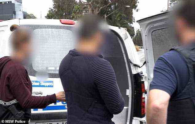 Detectives started investigating Baluch (pictured being arrested in June) last year after receiving a tip about a person gambling a huge amount of money at the Star Casino