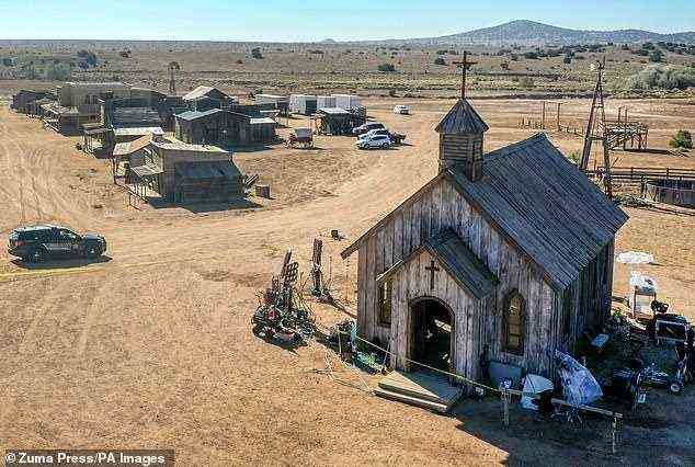It has emerged there were at least two and possibly three other accidental gun discharges on the set on October 16, a week before the fatal shooting. Following these incidents, a complaint was made to a supervisor about safety practices on the set. Pictured: The church on the ranch where Baldwin was rehearsing when the gun went off