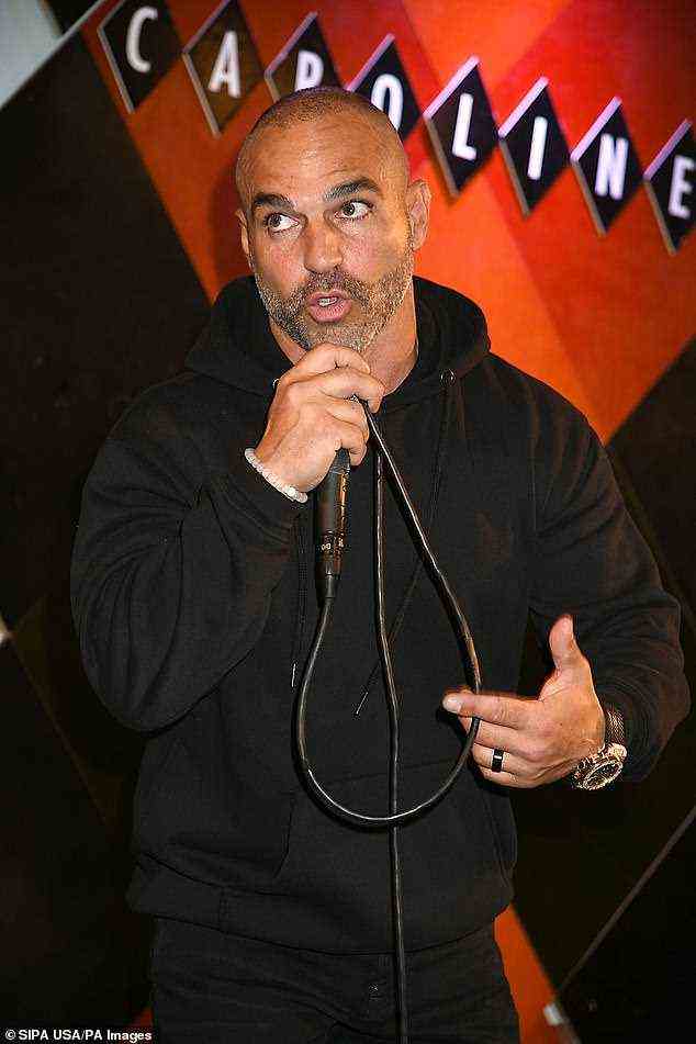 Confident: Gorga oozed confidence as he took to the stage in a solid black getup consisting of a cozy hoodie and pants