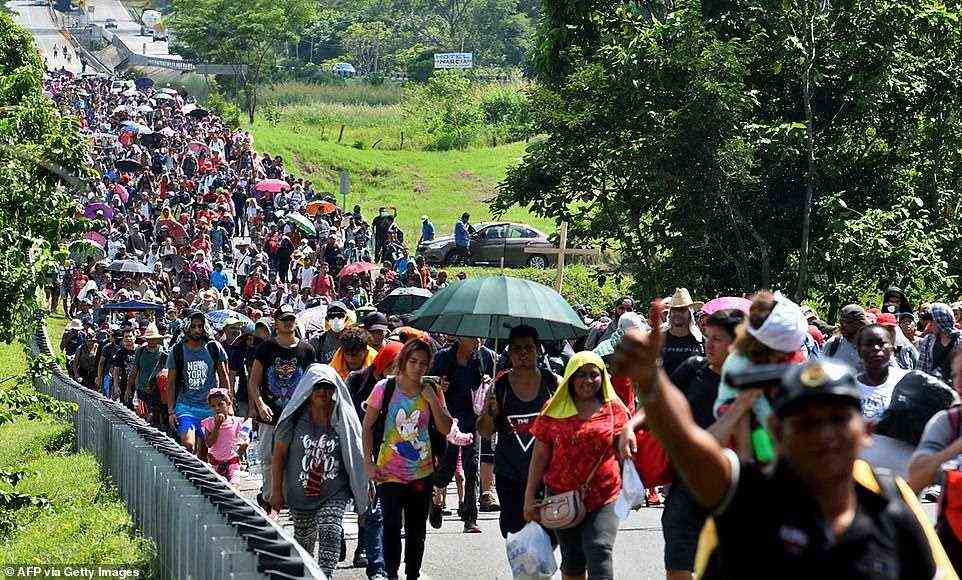 Migrants heading in a caravan to the US, walk towards Mexico City to request asylum and refugee status (pictured on Wednesday)