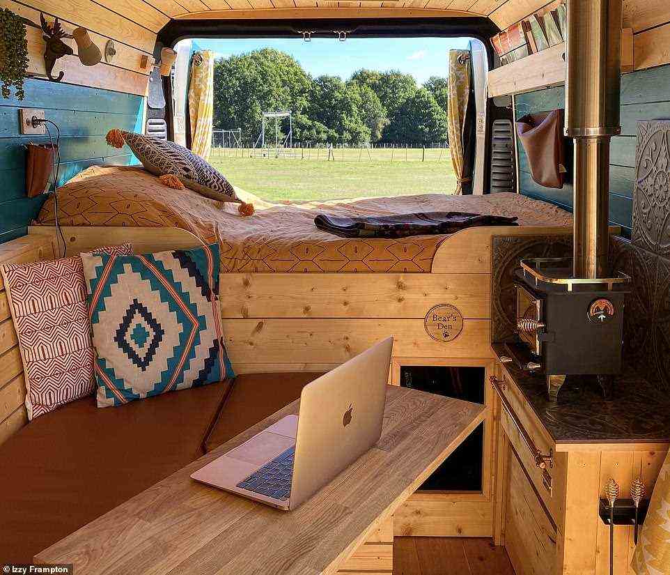 Izzy and Laurie describe their converted van, 'Grizzly', pictured above, as their very own 'cosy cabin on wheels'