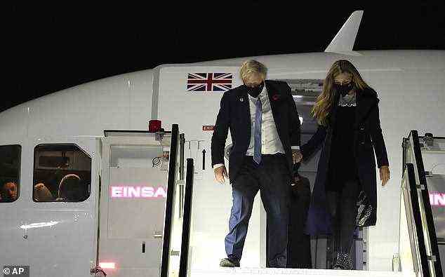 On Friday Mr Johnson stressed that the Government will do 'whatever is necessary' to ensure that British fishing fleets can go about their 'lawful' business. Above: The PM and his wife Carrie arriving in Rome for the G20 summit