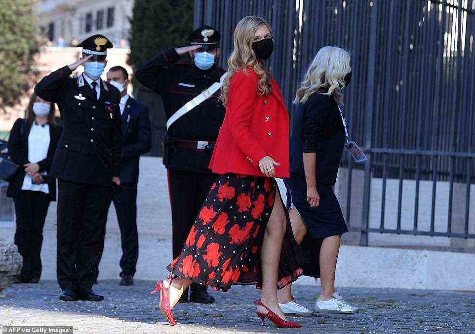 Fashionable  first ladies: In a nod to sustainability ahead of husband Boris Johnson's eco plea at COP26 tomorrow, pregnant Carrie Johnson recycled a red £59.99 Zara blazer worn earlier this month, which she coordinated with a matching skirt hired from Ibiza label De La Vali and Zara kitten heels