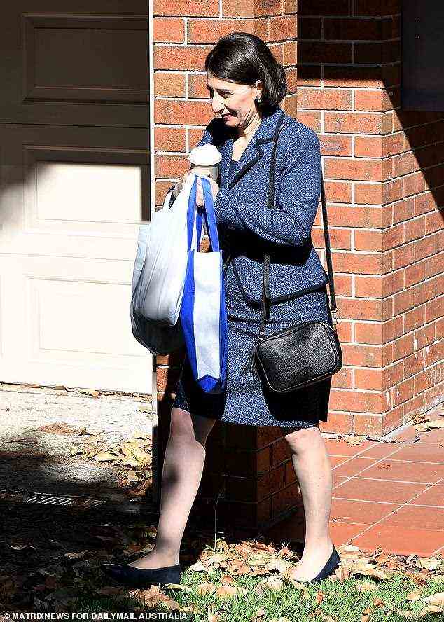 Gladys Berejiklian leaves her home on Sydney's leafy north shore on Wednesday morning as in inquiry into her continues at the Independent Commission Against Corruption