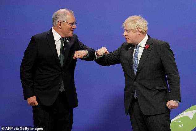 Morrison begrüßt seinen britischen Amtskollegen Boris Johnson am Montag beim G20-Gipfel in Rom