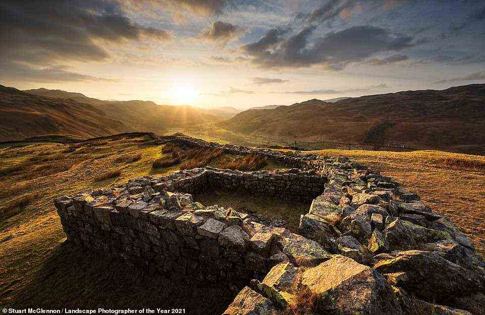 Commended in the History category, this breathtaking photograph puts a spotlight on the ancient Hardknott Roman Fort in Eskdale, Cumbria. Photographer Stuart McGlennon, who is behind the image, notes: 'The Hardknott Roman Fort is a place that's always intrigued me. The history behind this location is fascinating and I often wonder what life would have looked like watching the sun set over the Irish Sea in the distance from this viewpoint back in the age of the Romans. From a personal standpoint, I love the view especially in the winter when the low afternoon sun lights up the many intricate patterns in the walls'
