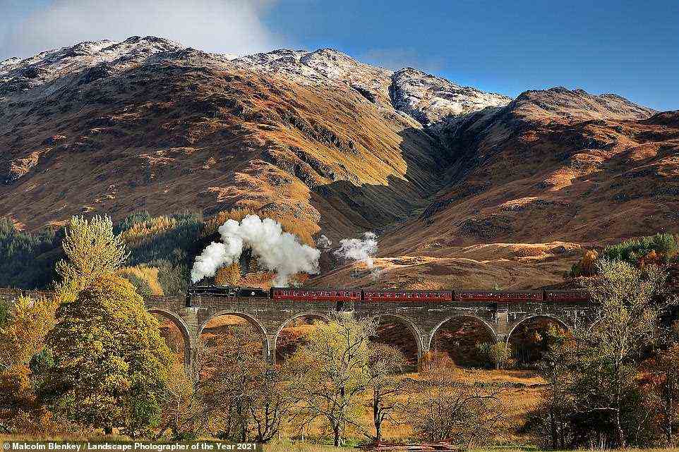 An awe-inspiring shot of the Jacobite steam train crossing the Glenfinnan Viaduct in Scotland's highlands (as seen in Harry Potter) is depicted in this picture, which tops the podium in the Lines in the Landscape category. Photographer Malcolm Blenkey says: 'I decided on this viewpoint rather than using the usual vantage points as I thought that if the sun broke through the cloud as the train arrived it would be the best way to show the juxtaposition of the natural beauty of the location in contrast to the mighty man-made structure'