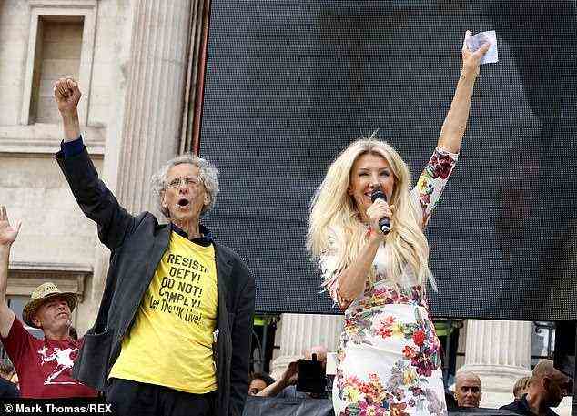 Pictured: Kate Shemirani with Piers Corbyn, brother of former Labour leader Jeremy Corbyn at massive anti-vaccine and lockdown rally in London last year