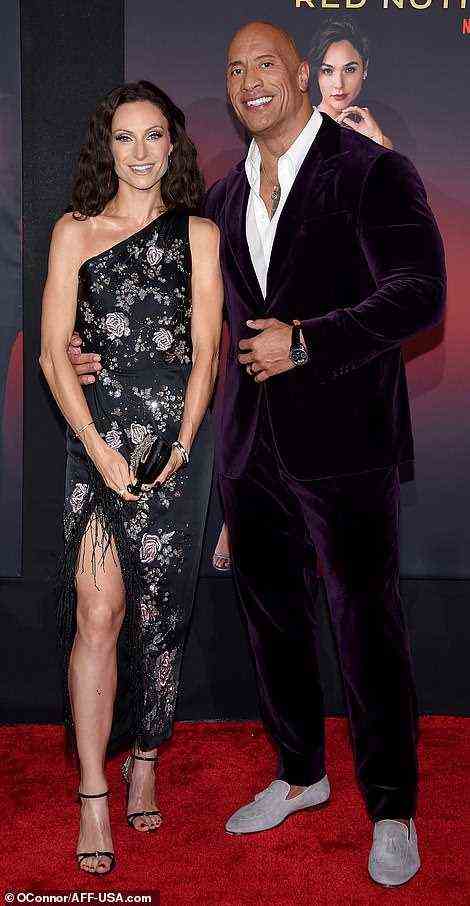 Arm candy: The 49-year-old action star posed beside his wife Lauren Hashian