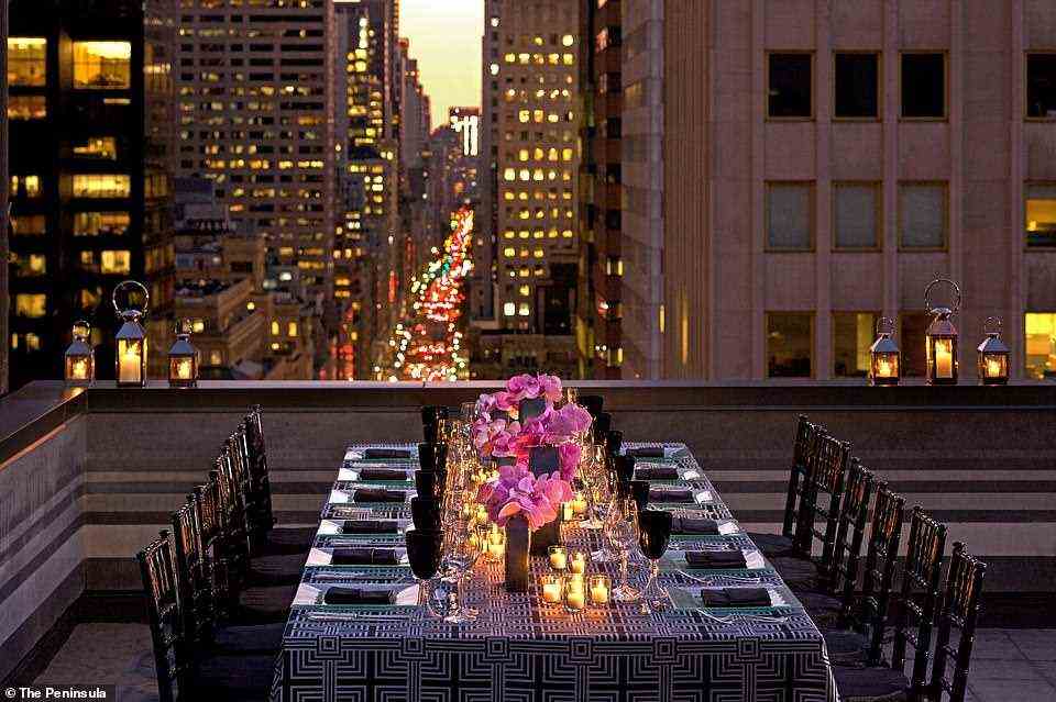 Pictured is a table set for a private dinner event on the Peninsula sun terrace
