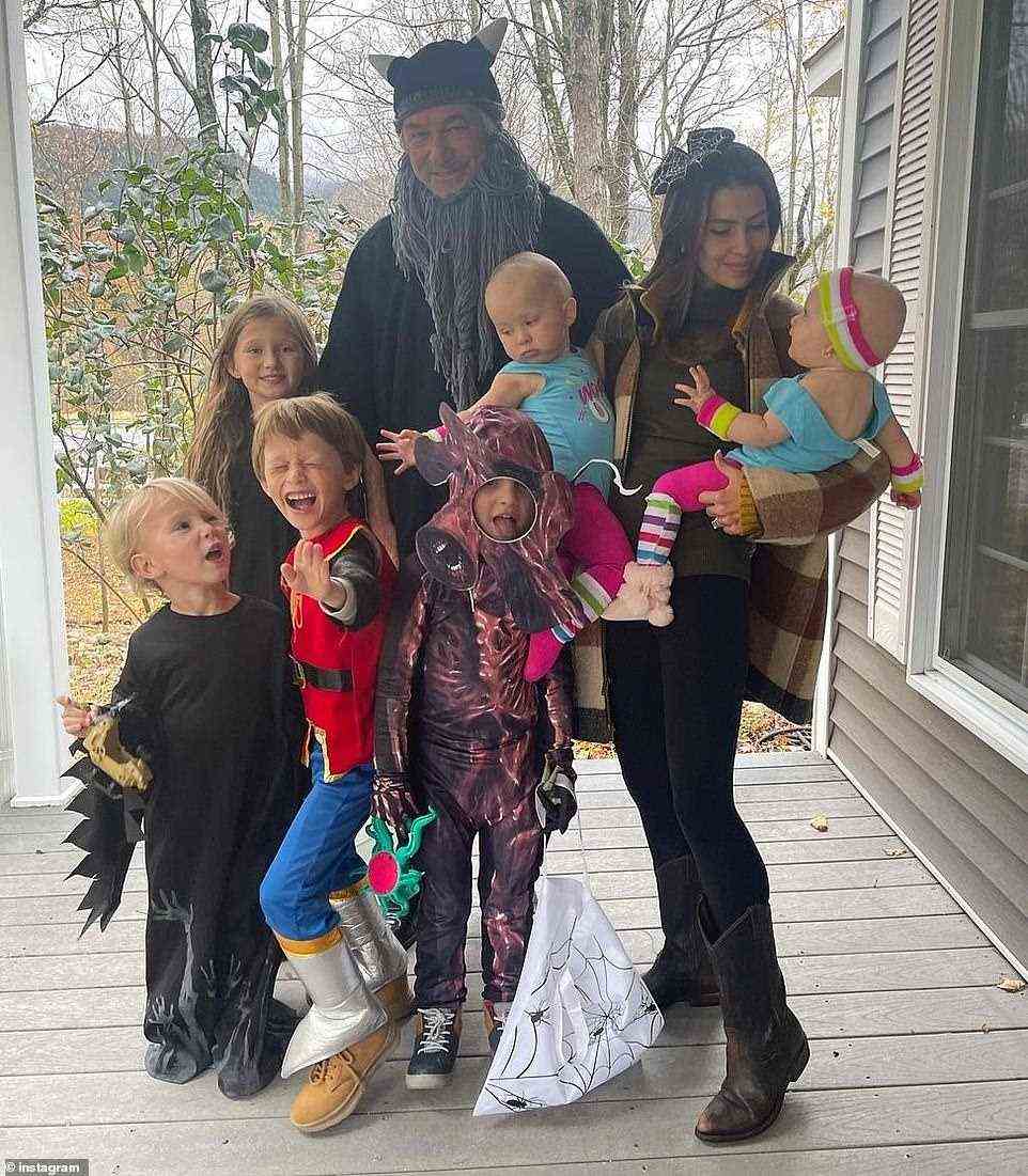 The couple moved their six children (seen on Halloween) to rural Vermont in the wake of the deadly shooting on October 21, when Alec accidentally killed his colleague Halyna while rehearsing a scene with a Colt gun that had live rounds in it