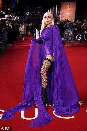 Unwirklich: Lady Gaga stellte sicher, dass alle Augen auf sie gerichtet waren, als sie am Dienstag in einem weitläufigen lila Kleid den roten Teppich der House Of Gucci-Premiere in London betrat