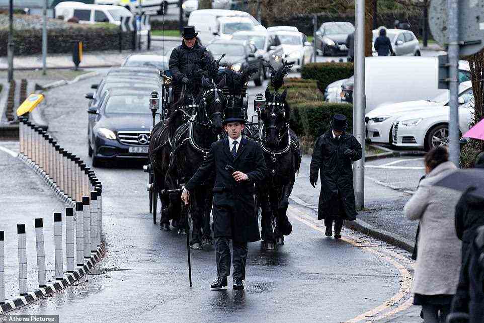A horse drawn carriage pictured arriving at St Tydfil's Old Parish Church last year. People lined the streets to say farewell to the hospital nurse ahead of her funeral last year