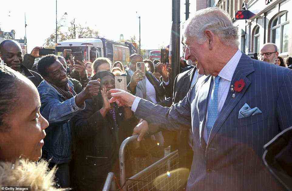 Prince Charles smiles with well-wishers after he departs meeting The Prince's Trust Young Entrepreneurs in Brixton today