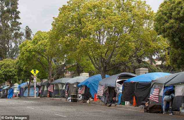 'Hell on earth': Paul lives in the once-elite beachside suburb of Venice, where a vast increase in homelessness has seen hundreds of tents line the beach's famous boardwalk and resulted in a sharp increase in crime