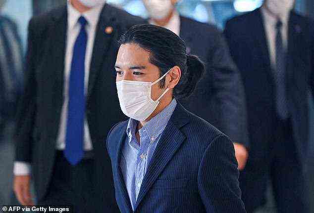 But his trip home only drew more negative publicity after he arrived at Narita Airport sporting a ponytail, a hairstyle that is deemed disrespectful