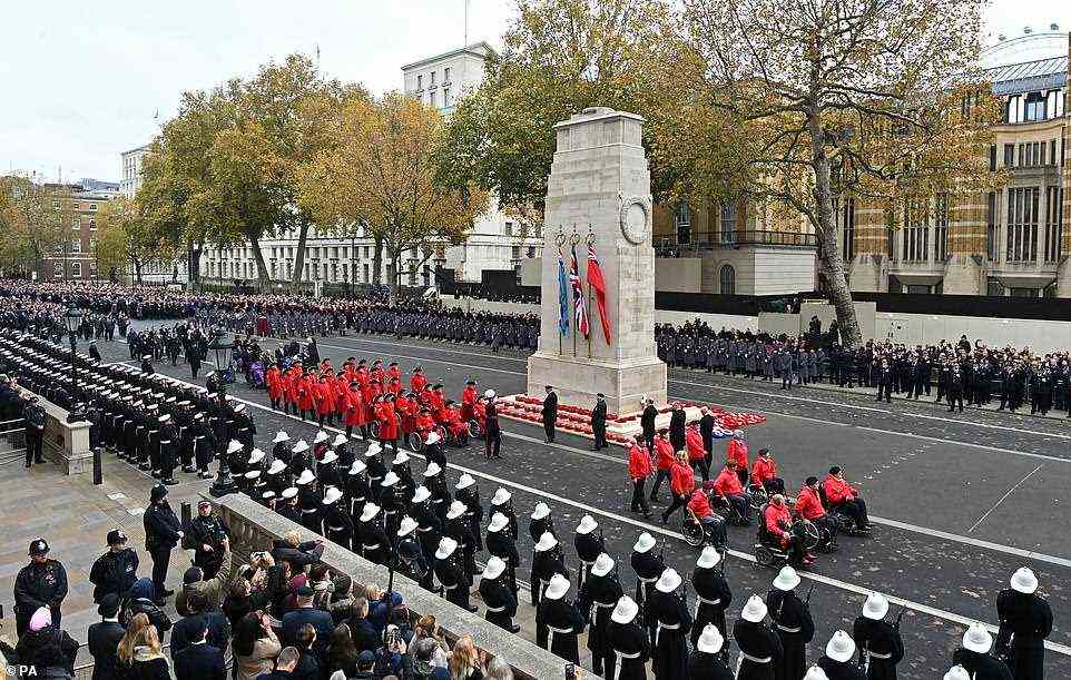Pictured: Veterans march along Whitehall during Remembrance Sunday service at the Cenotaph, in Whitehall