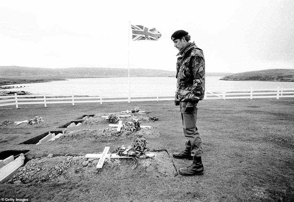 The 68-year-old was adept at capturing the solemnity of circumstances in single images. Pictured: A soldier at the grave of Victoria Cross recipient Lt-Col H. Jones at the Blue Beach War Cemetery in Port San Carlos, Falkland Islands, October 1982
