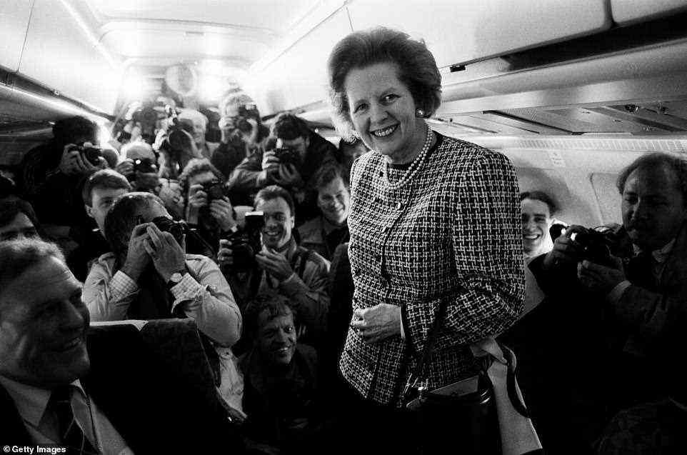After moving to Fleet Street in 1978, Stoddart quickly garnered a reputation as one of the UK's most dedicated and talented photojournalists. Pictured: British Prime Minister Margaret Thatcher on a plane during the 1985 election campaign