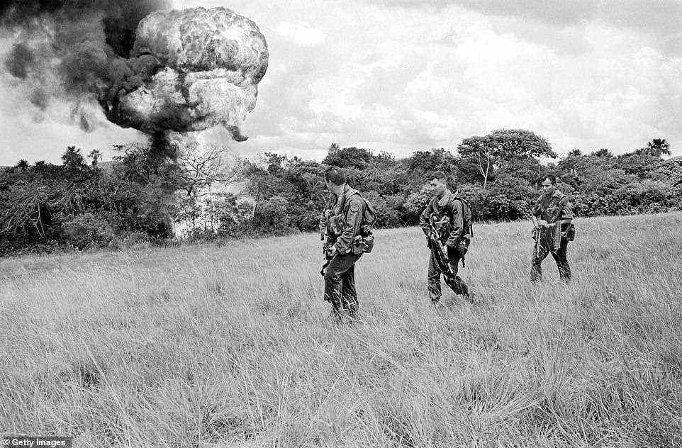 Special Forces after burning a cocaine-processing lab in the heart of the Colombian jungle in November 1996