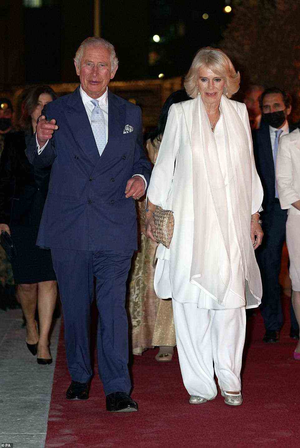 Stylish Charles put on a very animate display as he and Camilla made their way to the event (pictured, together)
