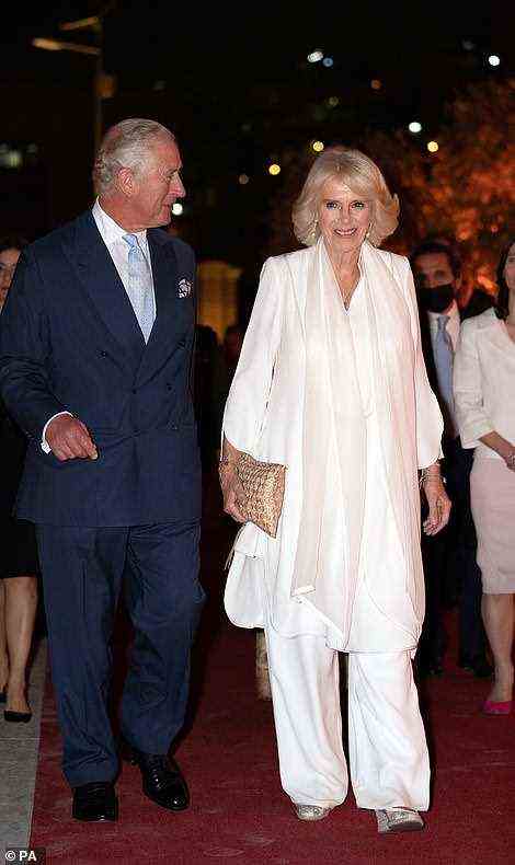 The Duchess of Cornwall looked very glamourous and accessorised with a gold clutch bag