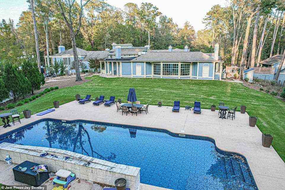 Pool party, anyone? There is a pool in the backyard with plenty of room to host guests