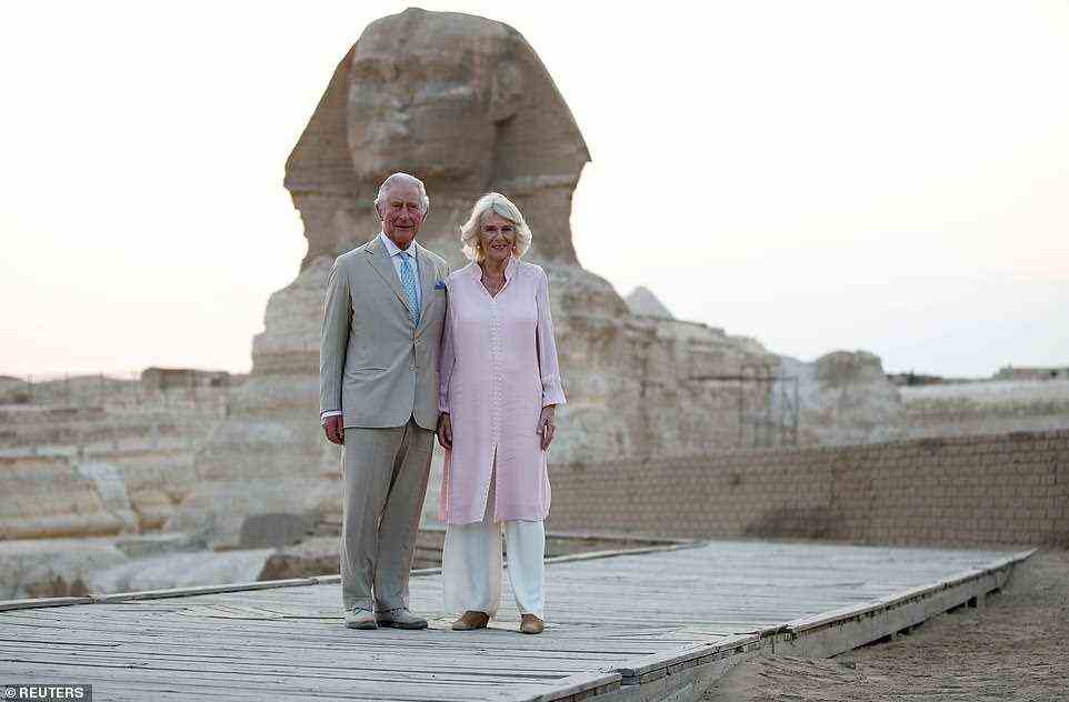 The royal couple looked in high spirits as they arrived at the Great Pyramid of Giza in Cairo on the first day of their Egypt tour, before posing in front of the Sphinx (pictured)
