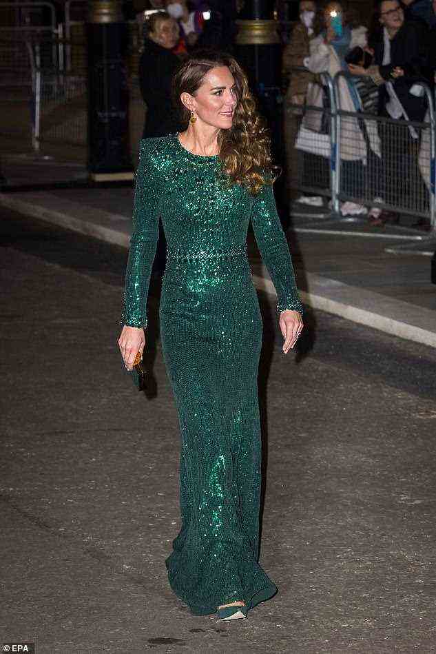 Kate looked the picture of elegance as she arrived in the embellished custom green gown (pictured)