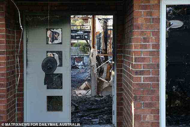 The fatal blaze caused extensive damage to the Werribee home (pictured on Monday)