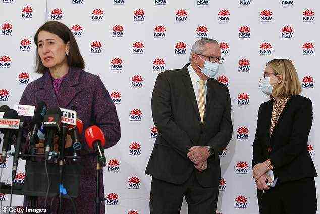 The government ignored Dr Kerry Chant's advice and brought in targeted restriction which divided the city (pictured, former premier Gladys Berejiklian, left, health minister Brad Hazzard and chief medical officer Dr Chant)