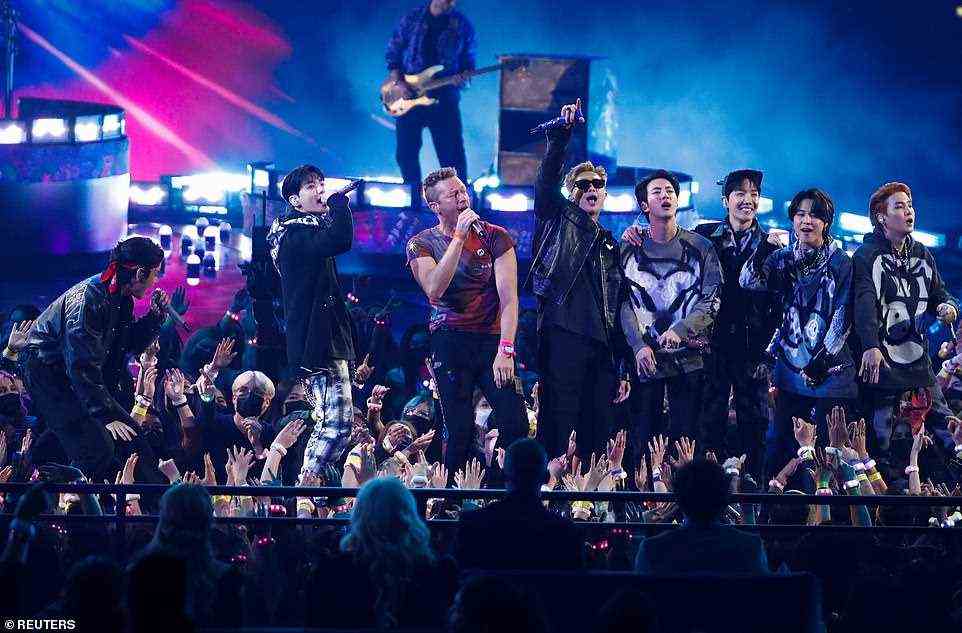 Unlikely pairing: Coldplay and BTS perform during the show