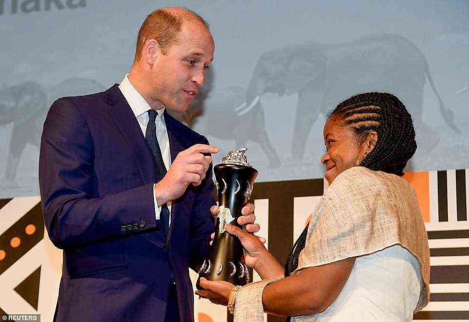 Tusk Award for Conservation in Africa winner Julie Razafimanahaka is all smiles as she collects her trophy from Prince William