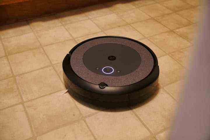 iRobot Roomba i3 Plus cleaning on the floor.