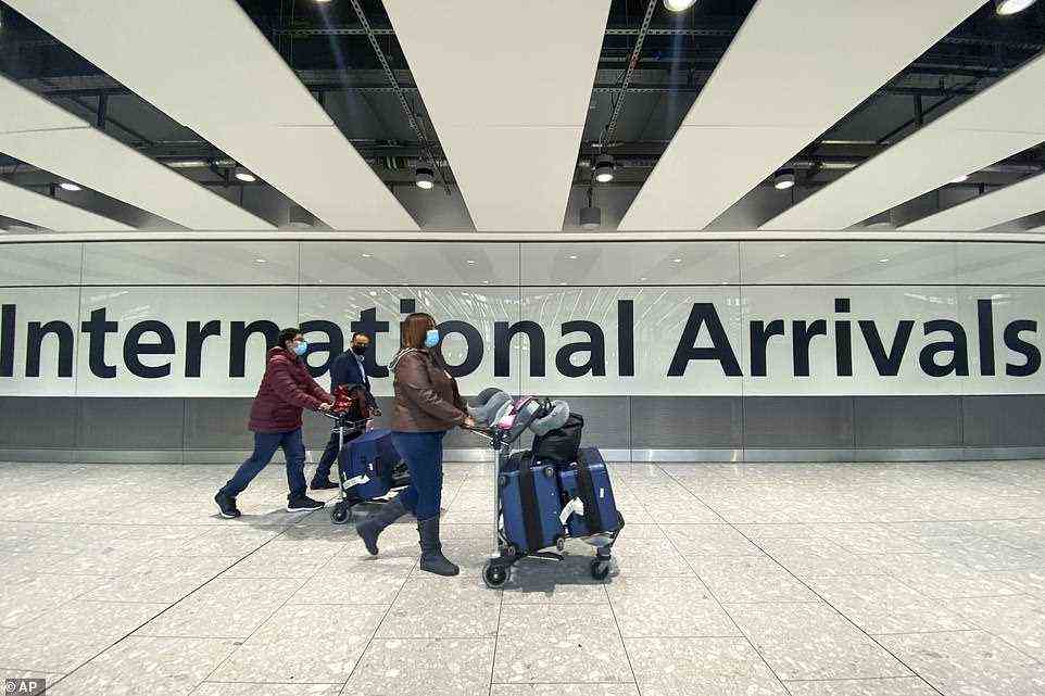Passengers arriving at Heathrow today after the South Africa flight ban was announced (it is not clear where these particular passengers had travelled from)