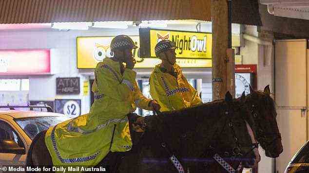 Police officers riding on horseback were seen patrolling the streets of Byron Bay's main centre on Saturday night