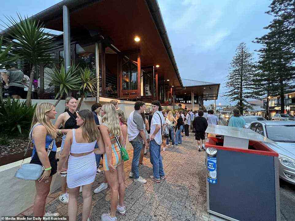 Schoolies madness: A large queue outside the popular Byron Beach hotel was seen from early on Saturday evening