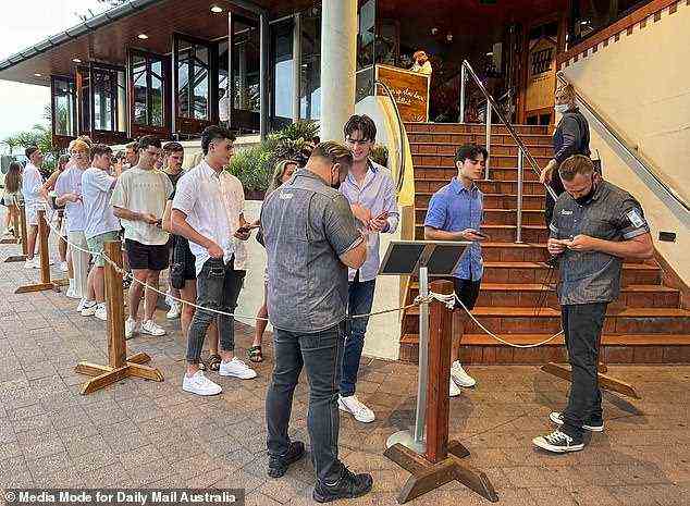 Security guards are seen checking the IDs of teenagers visiting the popular Byron Bay pub in front of the ocean on Saturday night