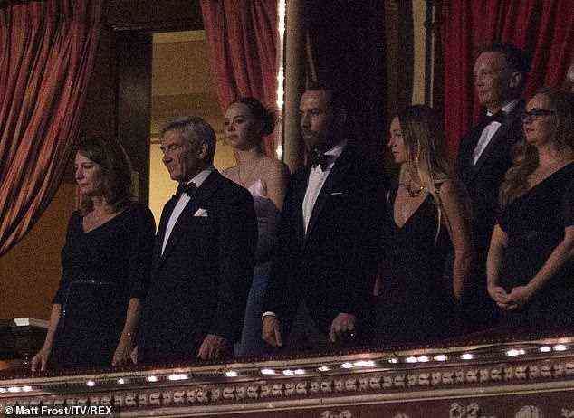 Kate Middleton's family made a rare public appearance last night as they joined the Duke and Duchess of Cambridge, both 39, at the Royal Albert Hall to watch the Royal Variety Performance (pictured left to right Carole and Michael Middleton, James Middleton and Alizée Thevenet)