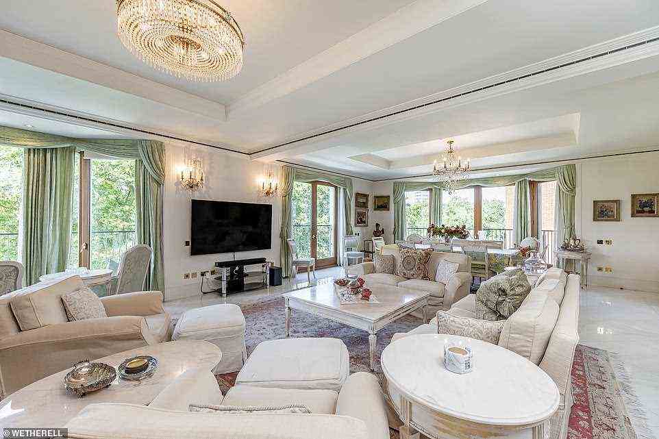 A Mayfair apartment which was once home to the founder of Selfridges department store on Oxford Street has hit the market for £19.95 million. The main reception room (pictured) has white-slab marble flooring and space for several seating areas provide the perfect venue for relaxation or entertaining.