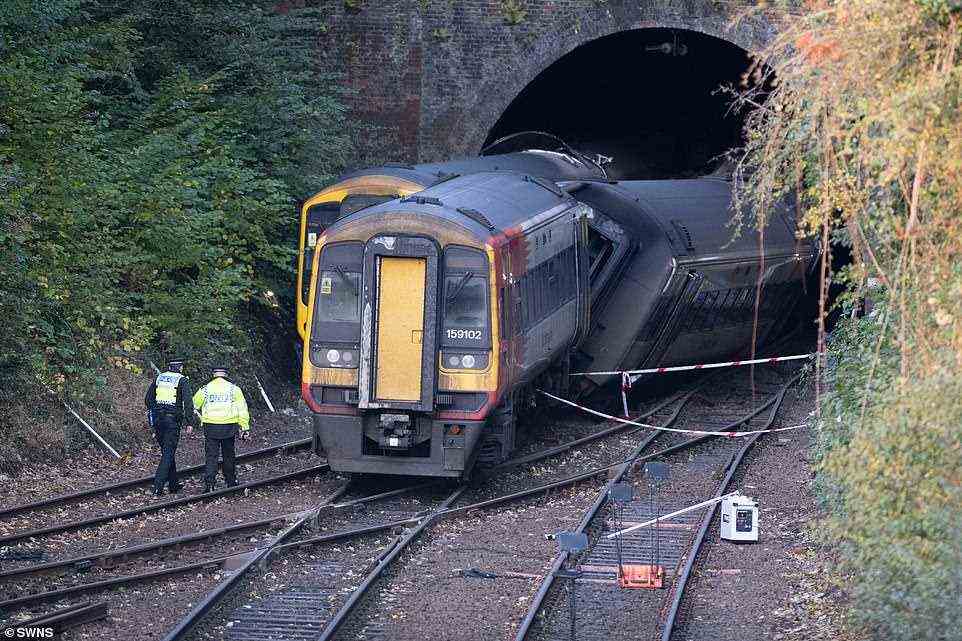 The scene at the Fisherton Tunnel in Salisbury today where the railway line remains closed for investigations after two trains collided