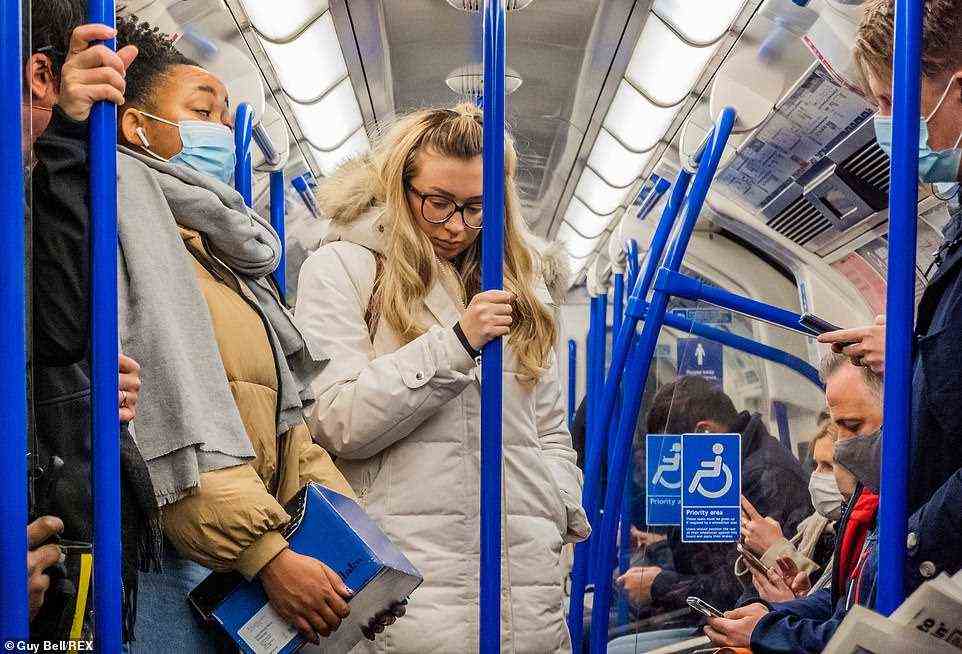 One commuter is seen not wearing a facemask on the Victoria Line as new restrictions come into force today