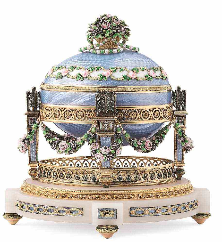 The Cradle with Garlands Egg (pictured) was given by Emperor Nicholas II to his mother Dowager Empress Maria Feodorovna. From 1890, the Imperial Easter Eggs' designs began to celebrate events in Romanov family life. This egg marks the family's joy at the birth of Tsarevich Alexei, a male heir, in 1904