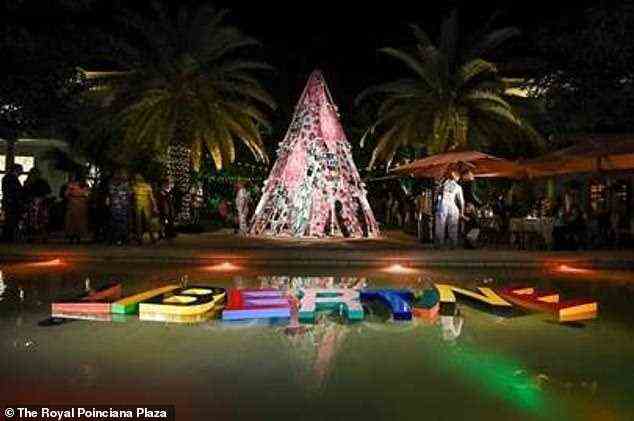 The world-renowned creator - who's dressed countless celebs including Mick Jagger, Cher and Usher - reimagined the property’s iconic surfboard Christmas tree and holiday décor like only he could