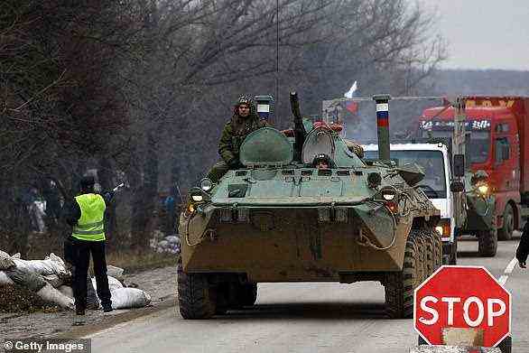 Russian armoured personnel carriers reported to be heading to Simferopol of Crimea, Ukraine on February 28, 2014