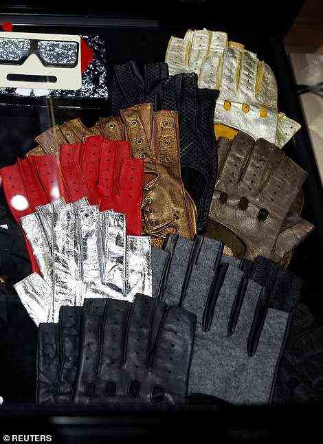 A few lots of fingerless gloves, which Lagerfeld wore often, hit the auction block