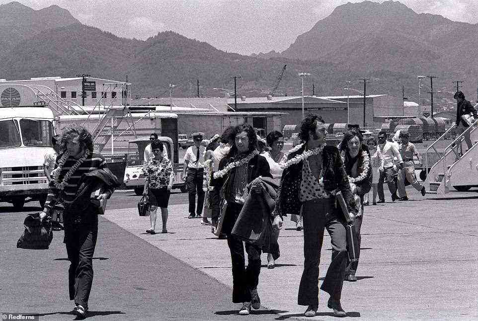 Here come the boys! Robert Plant, Jimmy Page, road manager Richard Cole and John Paul Jones arrive at Honolulu in 1969