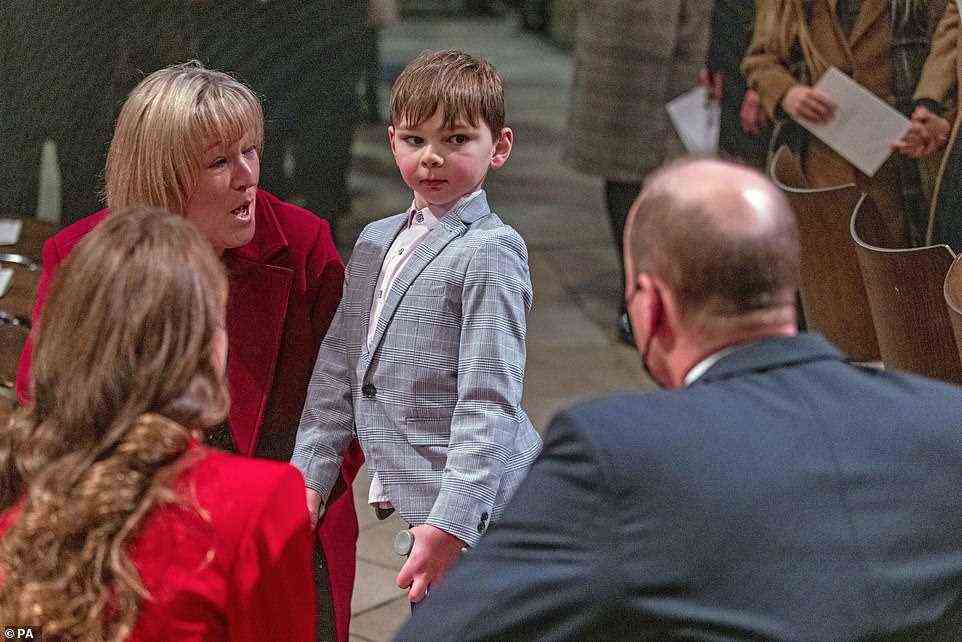 One young boy appeared delighted to be speaking with the royal couple ahead of the carol service today